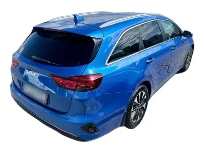NIEBIESKI KOMBI KIA CEED z 2024 r., BENZYNA, skrzynia biegów AUTOMATYCZNA 103KM, zdjęcie 17 z 20