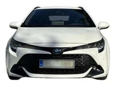 BIAŁY KOMBI TOYOTA COROLLA z 2023 r., HYBRYDA/BENZYNA, skrzynia biegów AUTOMATYCZNA 140KM, zdjęcie 12 z 19