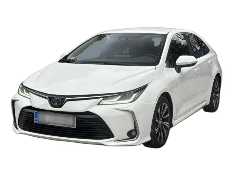 BIAŁY SEDAN TOYOTA COROLLA z 2022 r., HYBRYDA/BENZYNA, skrzynia biegów AUTOMATYCZNA 122KM, zdjęcie główne