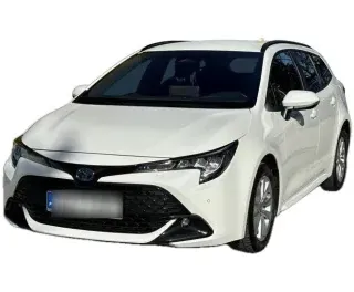 BIAŁY KOMBI TOYOTA COROLLA z 2023 r., HYBRYDA/BENZYNA, skrzynia biegów AUTOMATYCZNA 140KM, zdjęcie główne