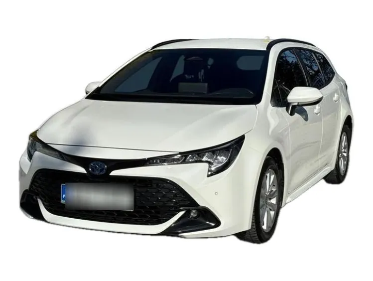 BIAŁY KOMBI TOYOTA COROLLA z 2023 r., HYBRYDA/BENZYNA, skrzynia biegów AUTOMATYCZNA 140KM, zdjęcie główne