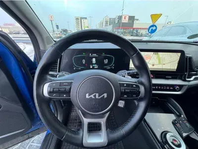 NIEBIESKI SUV KIA SPORTAGE z 2023 r., BENZYNA, skrzynia biegów AUTOMATYCZNA 110KM, zdjęcie 18 z 23