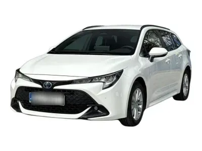 BIAŁY KOMBI TOYOTA COROLLA z 2023 r., HYBRYDA/BENZYNA, skrzynia biegów AUTOMATYCZNA 140KM, zdjęcie główne