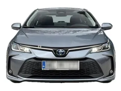 SZARY SEDAN TOYOTA COROLLA z 2023 r., HYBRYDA/BENZYNA, skrzynia biegów AUTOMATYCZNA 140KM, zdjęcie 16 z 18