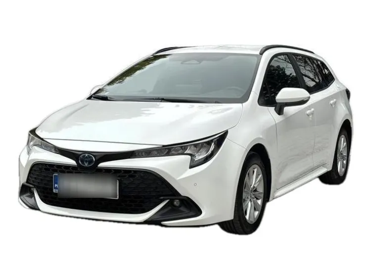 BIAŁY KOMBI TOYOTA COROLLA z 2023 r., HYBRYDA/BENZYNA, skrzynia biegów AUTOMATYCZNA 140KM, zdjęcie główne