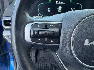 NIEBIESKI SUV KIA SPORTAGE z 2023 r., BENZYNA, skrzynia biegów AUTOMATYCZNA 110KM, zdjęcie 6 z 23