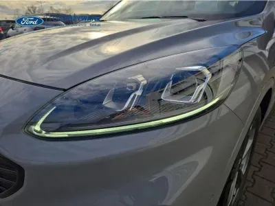 SZARY SUV FORD KUGA z 2024 r., HYBRYDA/BENZYNA, skrzynia biegów AUTOMATYCZNA 112KM, zdjęcie 8 z 28