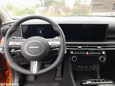 POMARAŃCZOWY SUV HYUNDAI TUCSON z 2025 r., BENZYNA, skrzynia biegów MANUALNA 160KM, zdjęcie 7 z 18