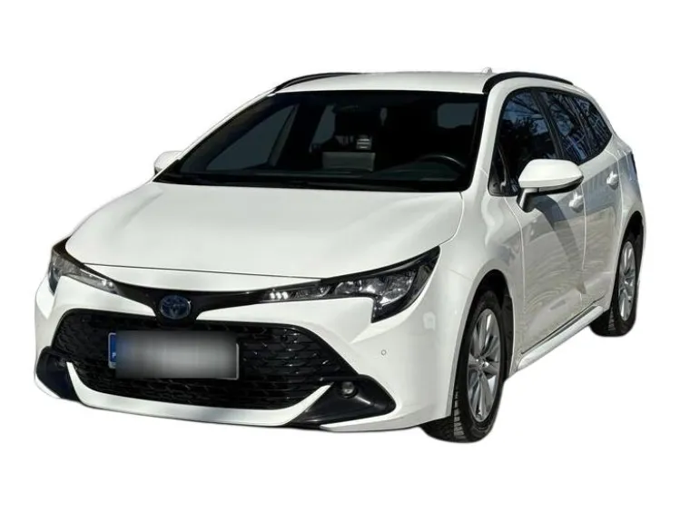 BIAŁY KOMBI TOYOTA COROLLA z 2023 r., HYBRYDA/BENZYNA, skrzynia biegów AUTOMATYCZNA 140KM, zdjęcie główne
