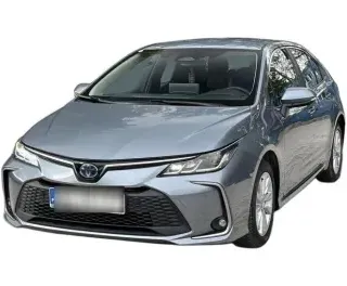 SZARY SEDAN TOYOTA COROLLA z 2023 r., HYBRYDA/BENZYNA, skrzynia biegów AUTOMATYCZNA 140KM, zdjęcie główne