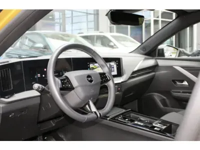 ZŁOTY HATCHBACK OPEL ASTRA VI z 2024 r., BENZYNA, skrzynia biegów AUTOMATYCZNA 130KM, zdjęcie 8 z 16
