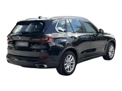 CZARNY SUV BMW X5 z 2022 r., HYBRYDA/BENZYNA, skrzynia biegów AUTOMATYCZNA 394KM, zdjęcie 4 z 19